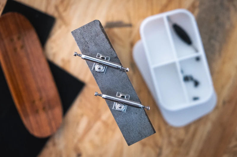 Silver fingerboard trucks without wheels and plywood fingerboard 
