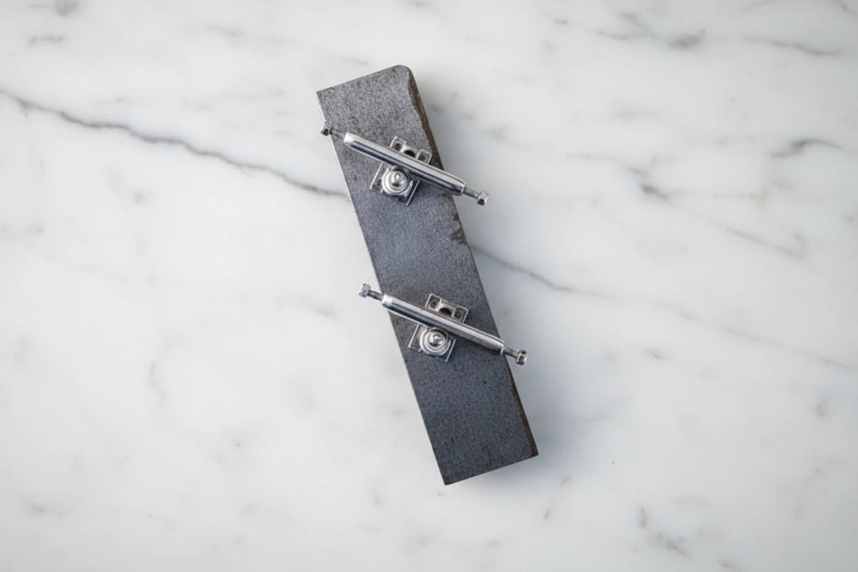 Silver fingerboard trucks without wheels 