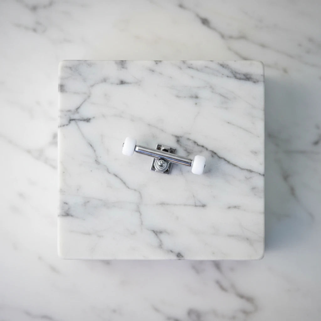 Silver trucks for fingerboard with ABS wheels